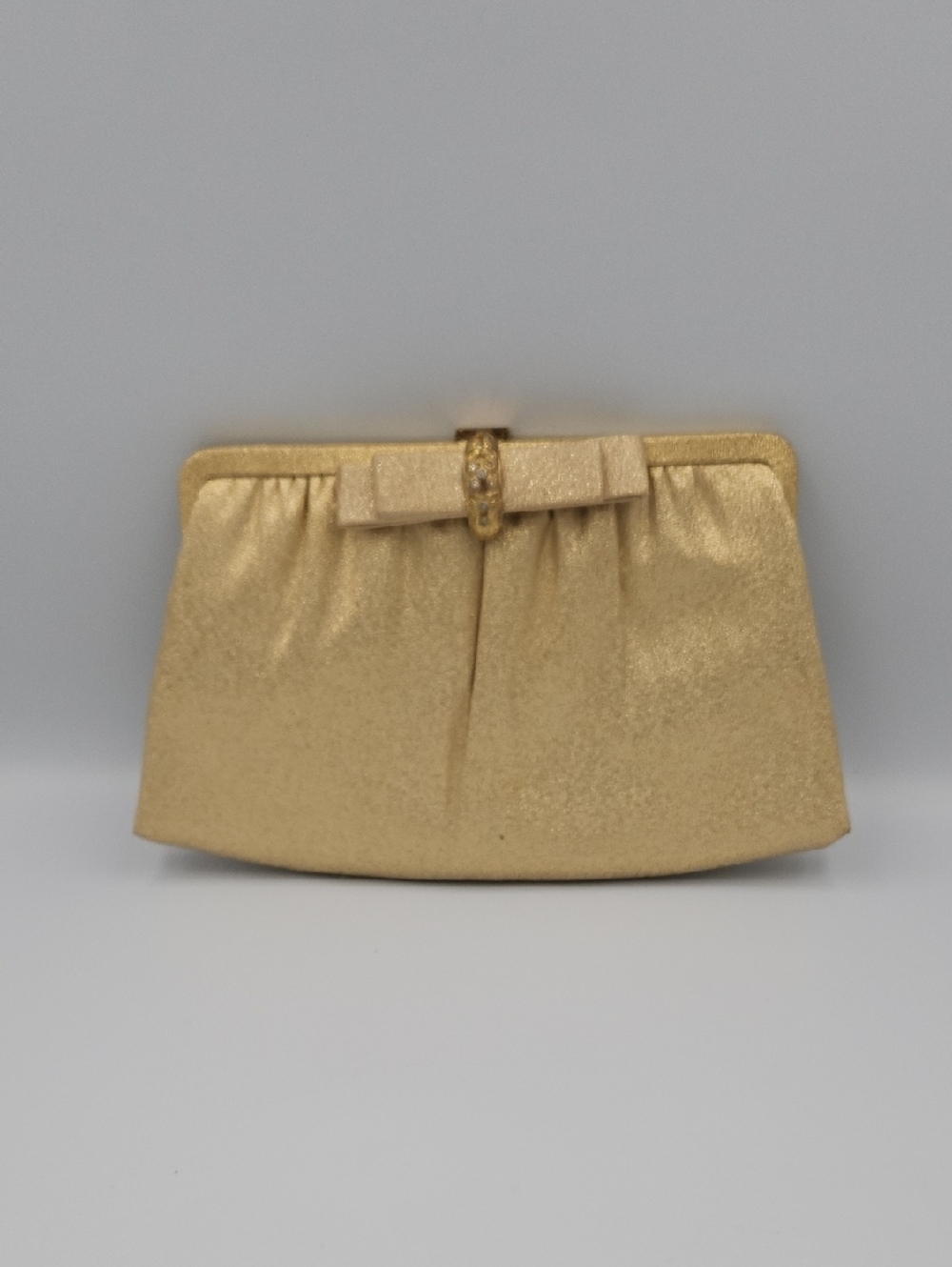 Elegant Gold Evening Clutch with Bow Accent